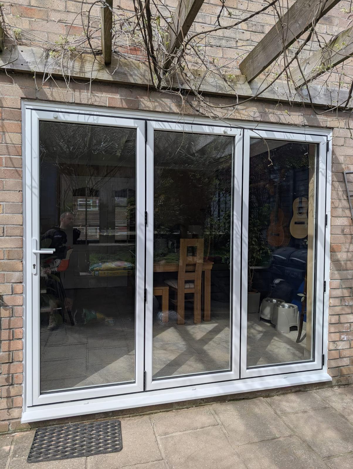 uPVC Bi-folds installation by Essential Glazing Products