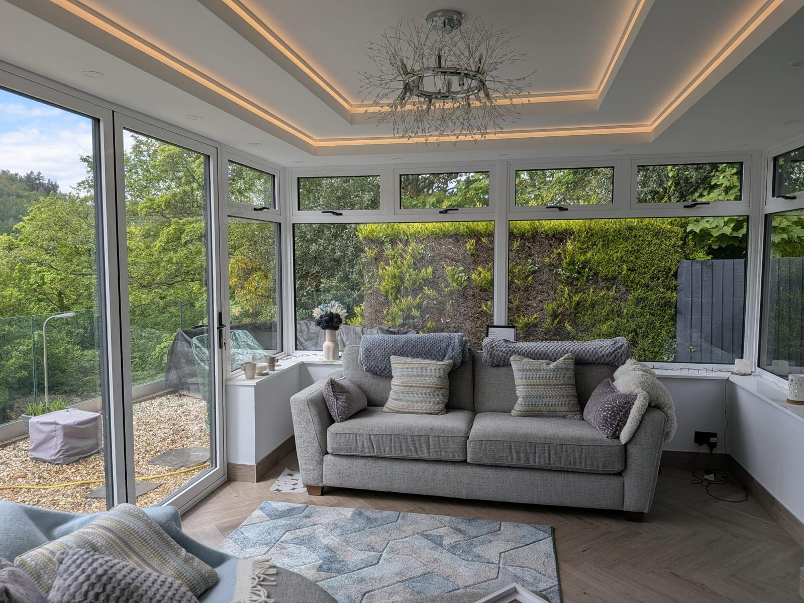 Bright uPVC conservatory interior with valley views in Gwent