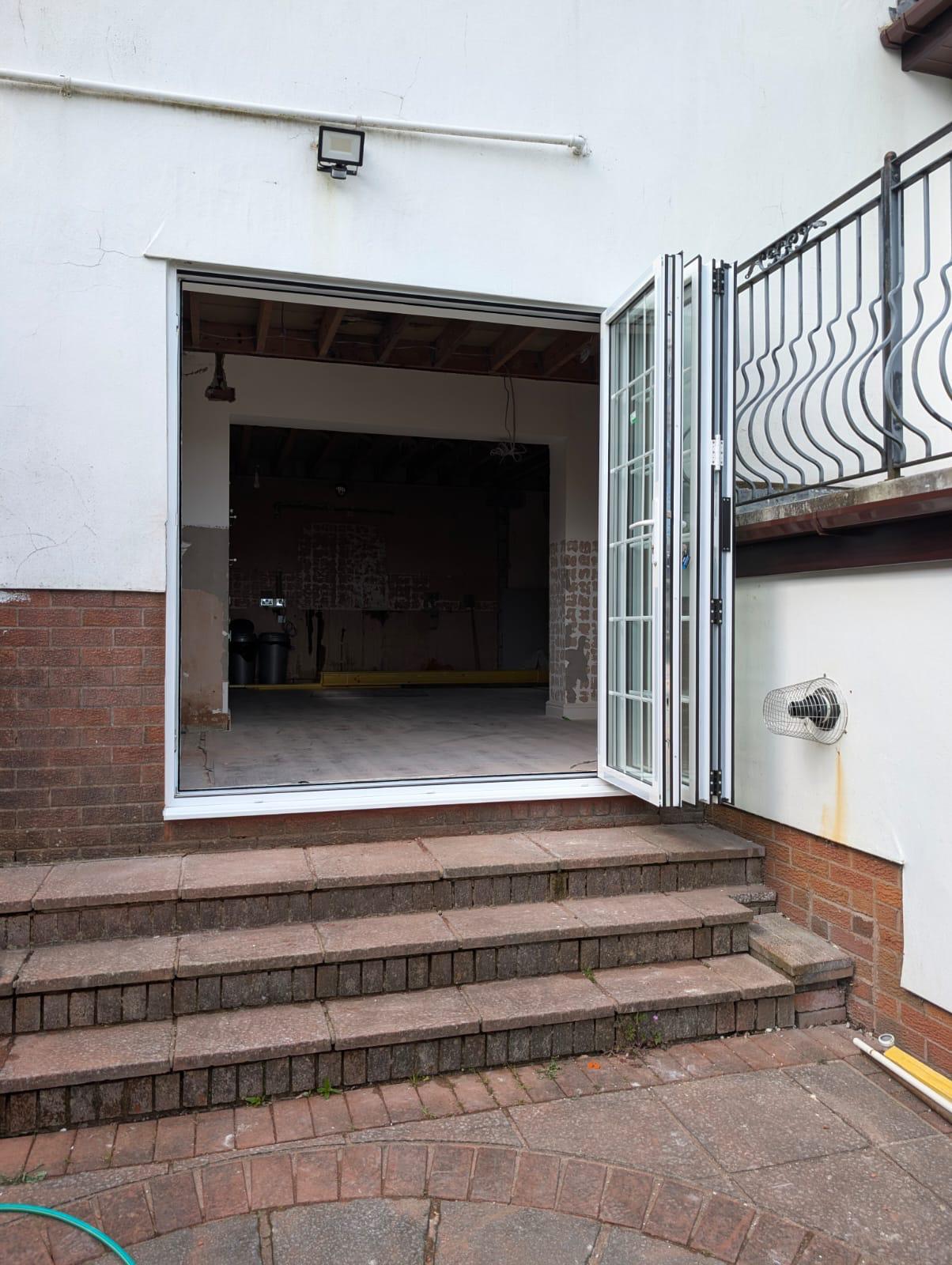 uPVC Bi-folds installation by Essential Glazing Products