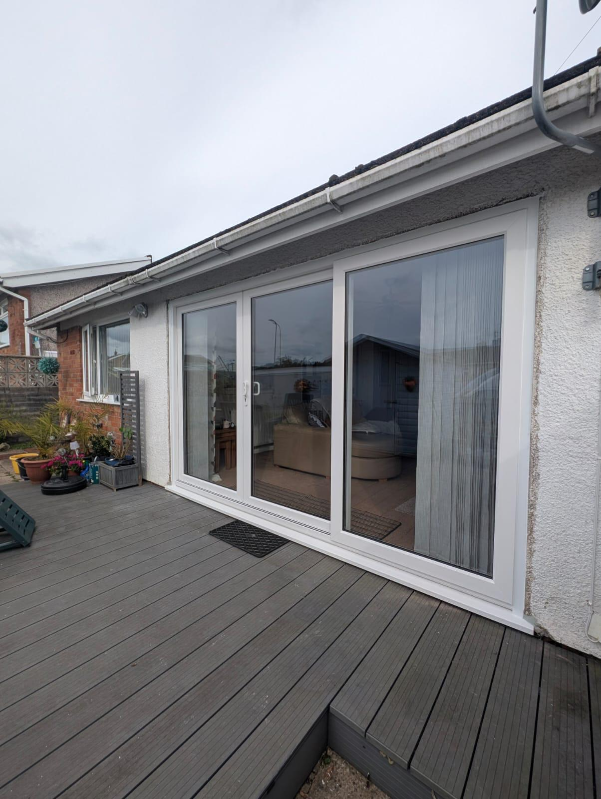 White uPVC sliding patio door fitted to a Gwent bungalow